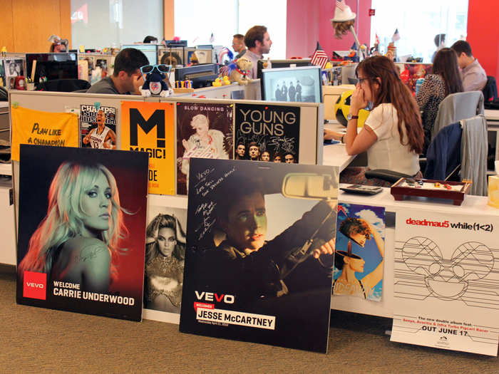The Vevo office hosts private performances from artists a few times a week. Each time an artist visits, they sign a Vevo poster for the office.