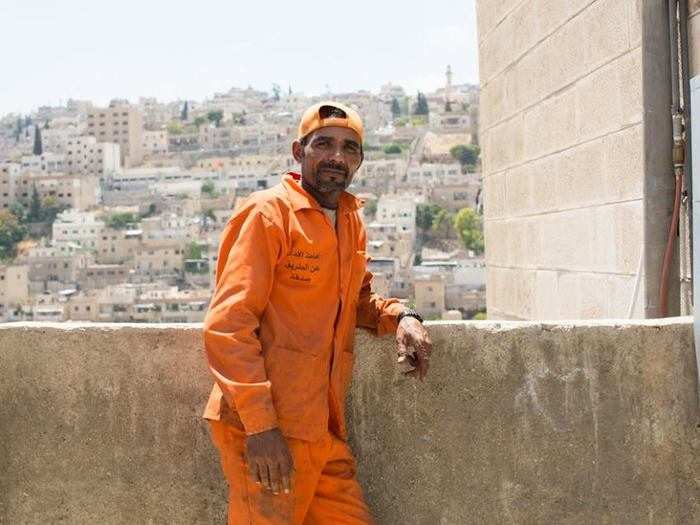 "I clean the streets. I used to work as a lifeguard at a fancy hotel on the Dead Sea, but I lost my job. I brought some of the mud from the beach to my cousin because it is good for your skin. My manager said: ‘Hey! We can sell that! You’re stealing!’" (Amman, Jordan)