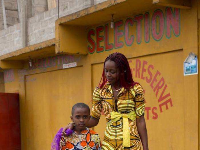 "I’m studying to be a lawyer. He likes books about frogs." (Kasangulu, Democratic Republic of Congo)