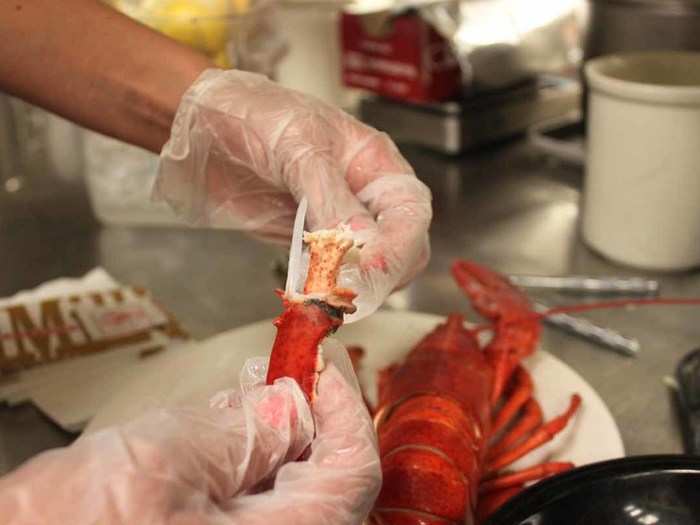 Use the pick to pull the meat out from the shell.