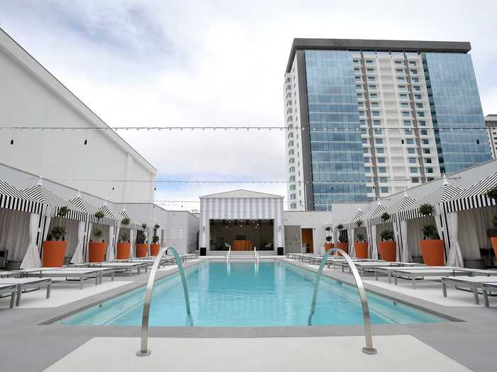 And here is the luxurious outdoor pool with plenty of cabanas.