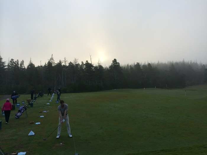 Here are people at the range warming up as the sun tries to break through the morning clouds.