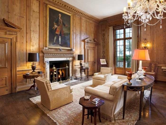 The mansion has 14 fireplaces, a series of sitting rooms, and a library.