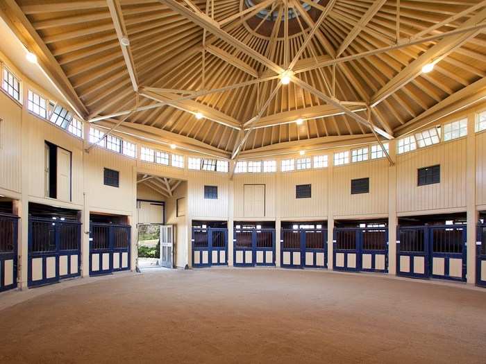 The estate has ample equestrian facilities, including this barn and stable complex. At one time, there were over 30 horses on the property.