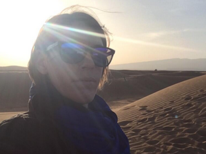 The week before, she stopped to take a selfie on the top of a sand dune in the Sahara Desert.