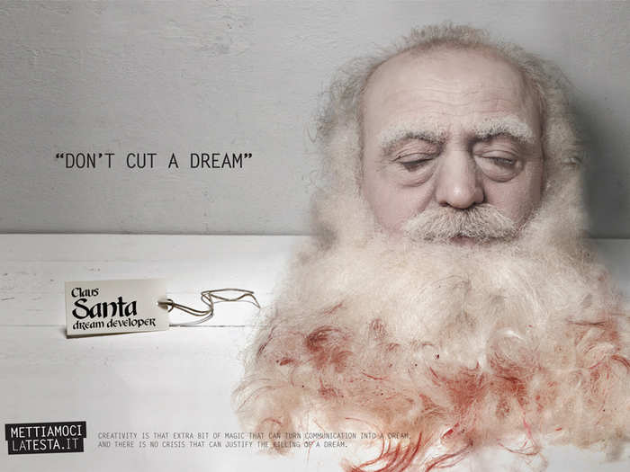 Mettiamocilatesta.it used a decapitated Santa to ask people to keep spending money on advertising. "Don