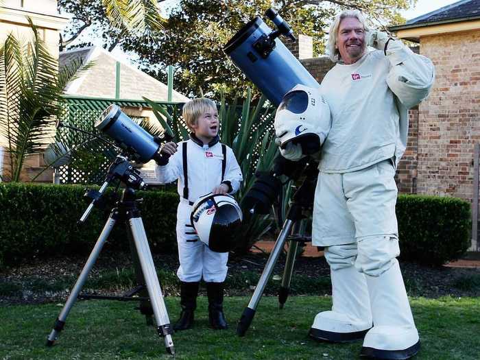 Branson dressed as an astronaut to celebrate the anniversary of Virgin Money, holding a contest to send someone into space on a future Virgin Galactic flight.