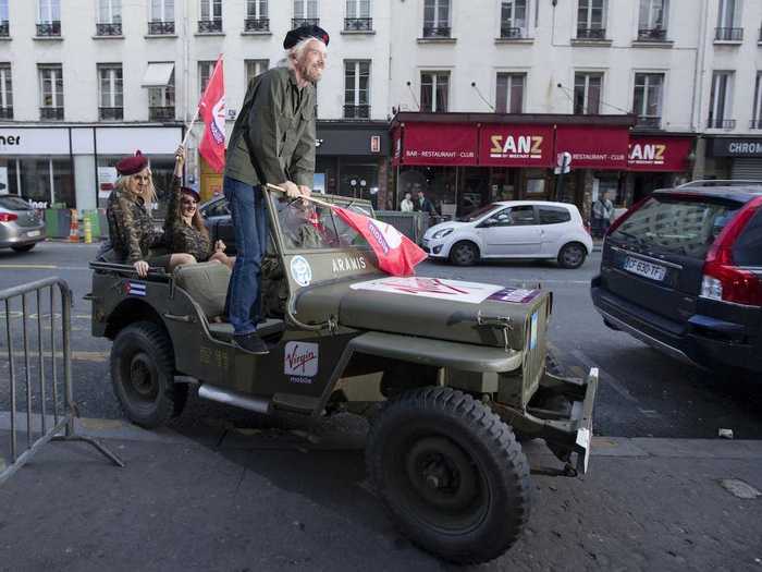 Branson arrived to a 2013 Virgin Mobile news conference in a vintage military jeep, his clothes an allusion to Latin American revolutionary Che Guevara.