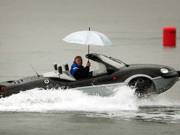 In this photo, Branson test drives his amphibious vehicle, which he took on a record-breaking trip across the English Channel in 2004.