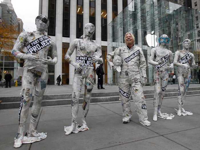 For the launch of his iPad-exclusive magazine Project in 2010, he posed in a newspaper suit alongside mannequins outside New York City