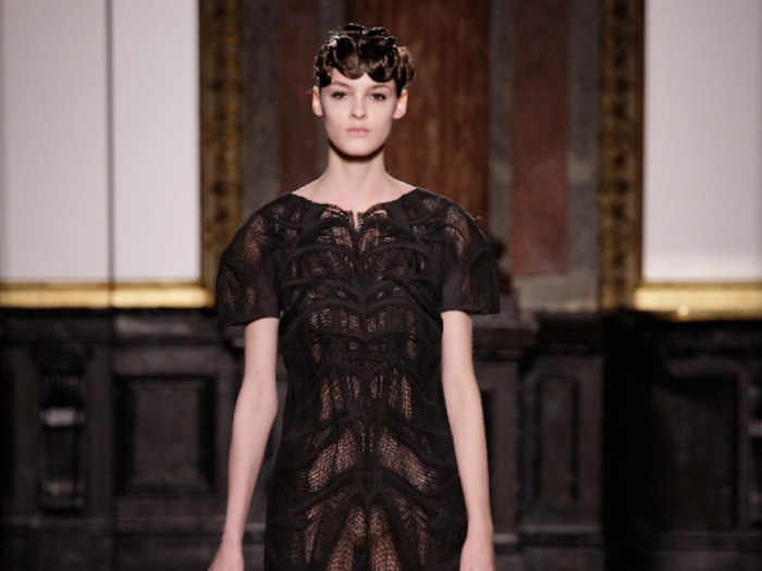 Dutch designer Iris Van Herpen was one of the first to use 3D printing techniques in fashion, and in January 2013, she debuted this intricate, lace-like dress that was created with a laser printing technique by Belgian company Materialise.