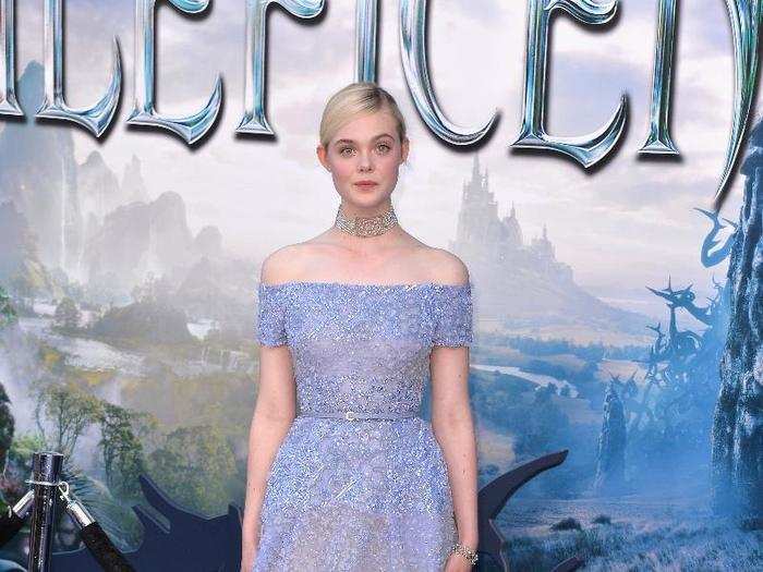 Elle Fanning channels a Disney princess in this ethereal Elie Saab dress at the Hollywood premiere of Maleficent.