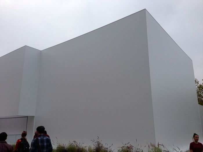 The huge white cube loomed large. What could be in there?