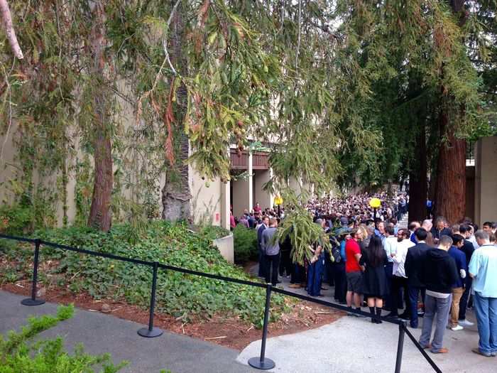 These Apple employees waited in line to enter the Flint Center.