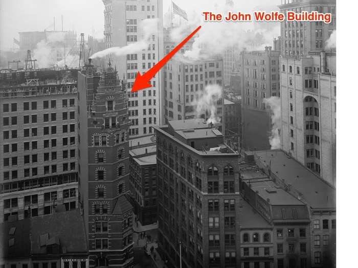 The John Wolfe Building was built in 1895 in the Financial District. It was demolished in 1974 to widen the street.