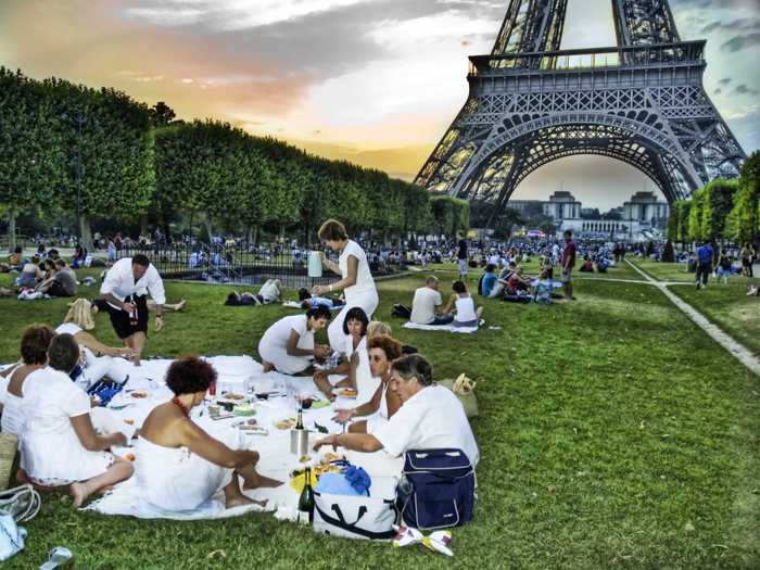 Pick up a fresh baguette, some stinky cheese and a bottle of wine, and picnic under the Eiffel Tower, in the Champ de Mars.