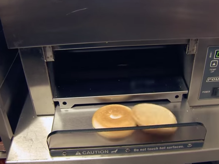 The buns come out of the toaster within seconds, looking perfectly browned.