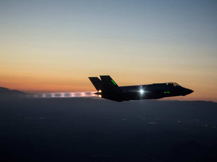 An F-35 Lightning II completes a series of night flights, testing the pilot