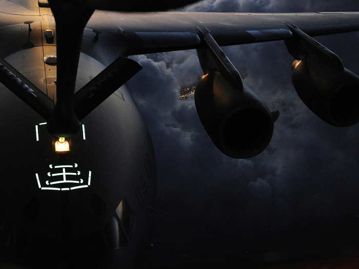 Utah Air National Guard Airmen conduct air refueling operations with a C-17 Globemaster III assigned to Joint Base Lewis-McCord, Wash., over southern Idaho. The Airmen are assigned to the 151st Air Refueling Wing at Salt Lake City Air National Guard Base, Utah, and support air operations across the western United States.