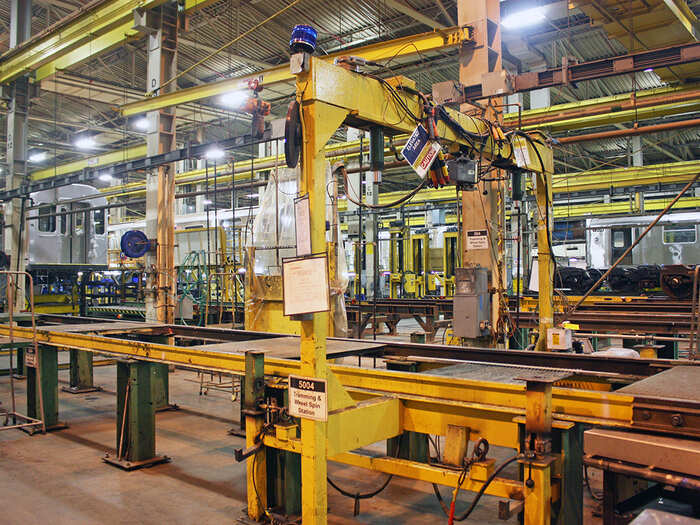The cars go through rigorous testing at each stage of the building process. This machine runs several tests, including one which simulates the full weight of a subway car completely filled to capacity. During each work contract, a "customer" inspector who is designated and hired by the authorities contracting the work oversees the examinations.