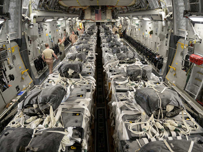 The C-130 can carry a vast range of cargo. Here, the US Air Force carries humanitarian supplies for an airdrop over Amerli, Iraq on August 30, 2014.