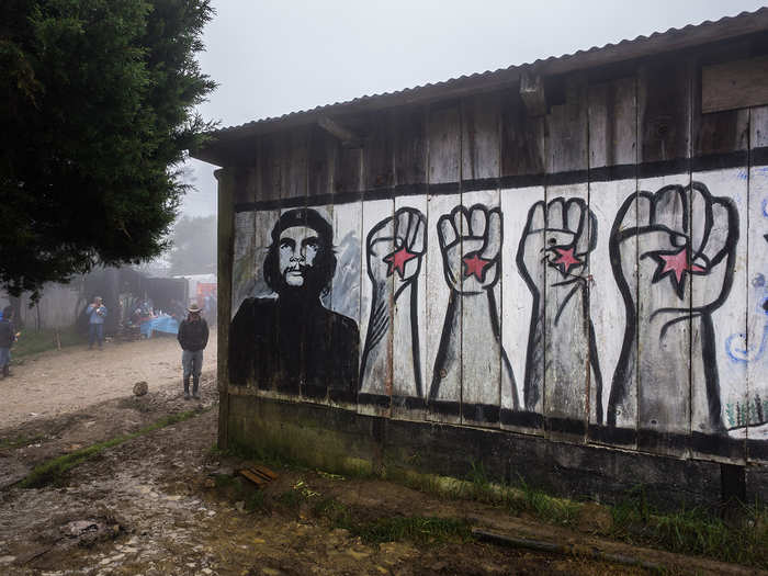 Zapatista art and murals has long depicted cultural heroes of resistance, like Emiliano Zapata or Che Guevara, seen here. A sign on the outskirts of one of the towns reads, "