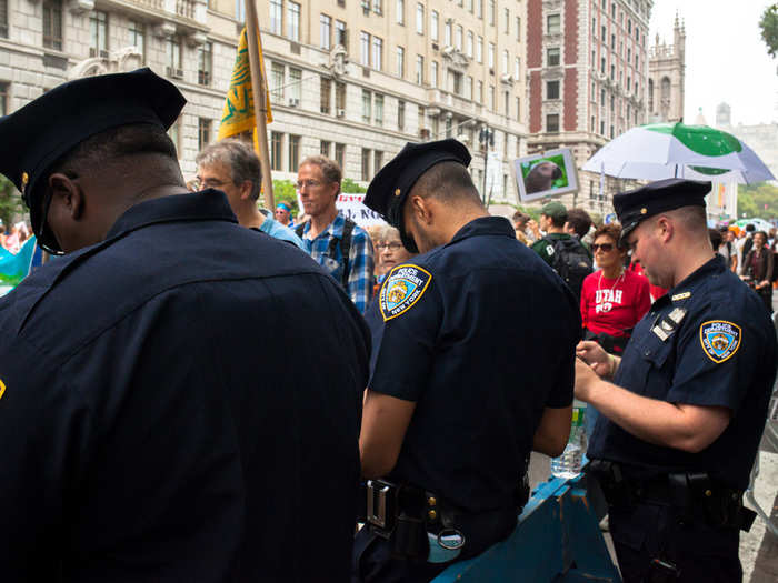 There were two or three NYPD officers stationed about every 100-200 feet. Most looked uninterested and bored, though a few took part in the general atmosphere.