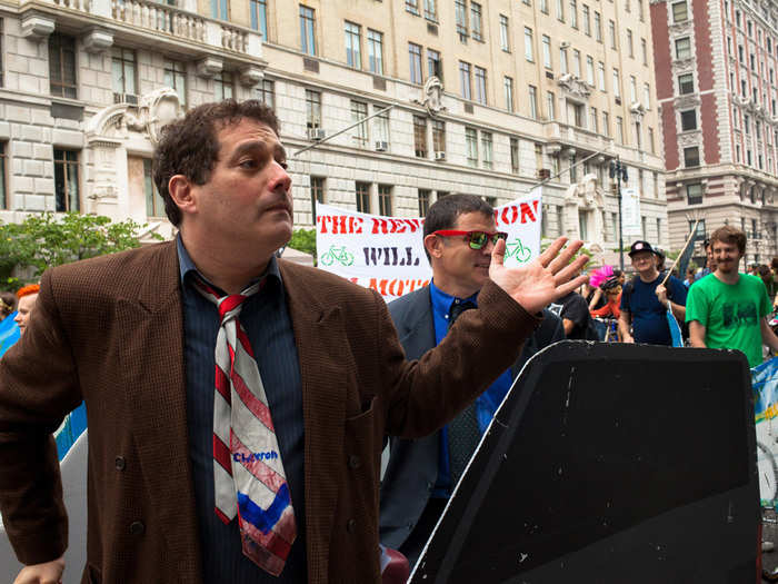 These guys were riling up the crowd, posing as oil executives in an "SUV" and telling the marchers that the science is far from decided on climate change.