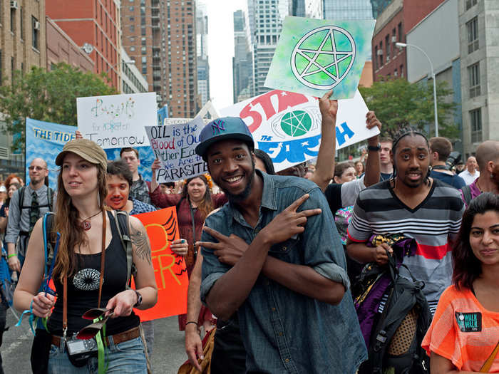 A lot of people in the crowd were involved with efforts beyond the march too. The guy smiling in the foreground here works with an ecology magazine.