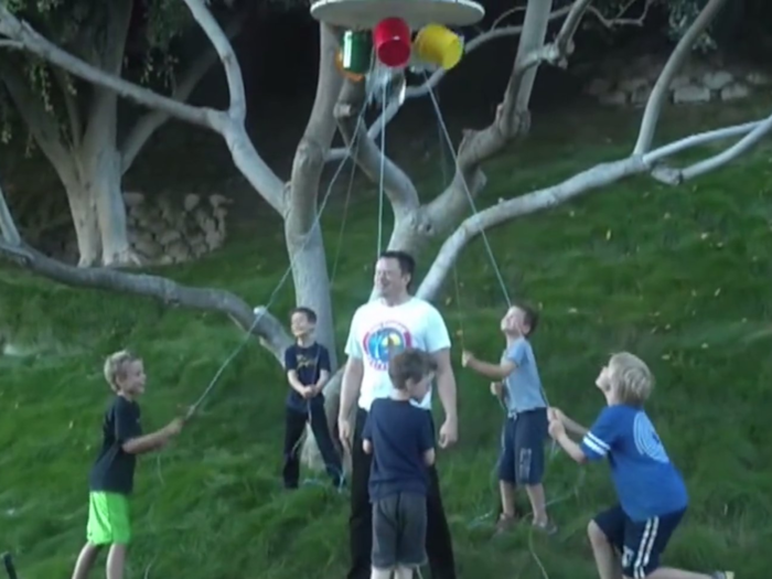 Elon Musk had both twins and triplets with his first wife. Here, his five sons help him out with the ALS "Ice Bucket Challenge."
