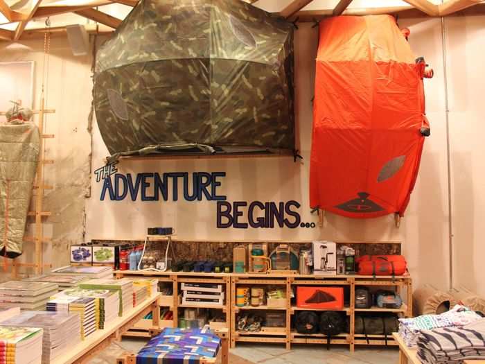 The section features running shoes, leggings, t-shirts, and all kinds of camping gear.