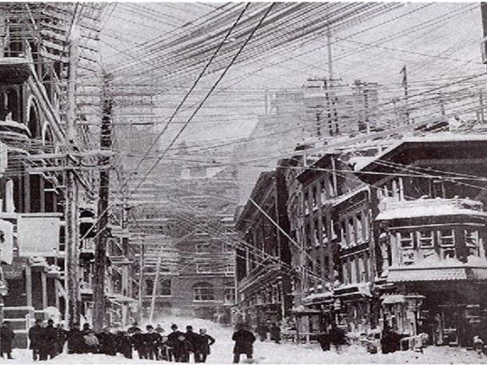 Telegraph wires (many of which would have connected tickers) created a virtual canopy above downtown Manhattan.