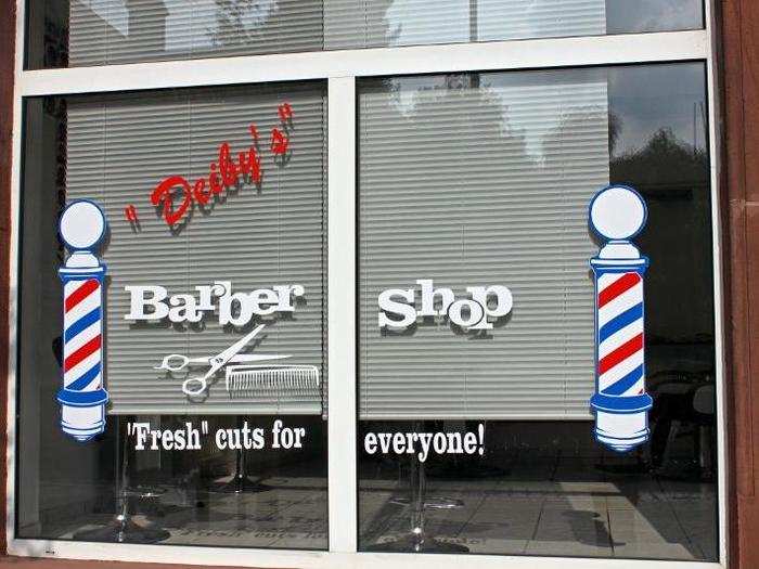 Across from the church is an American-style barber shop, an indicator of the tens of thousands of expats living nearby.