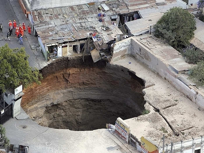 Three people went missing after this cavity devoured several homes in Guatemala City in February 2007.