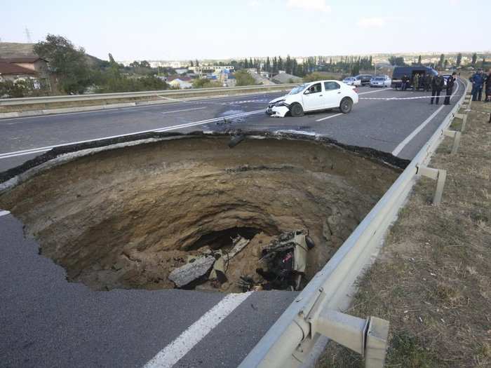 This week, a sinkhole that collapsed part of a street in Ukraine killed six people who were riding in a car that fell into the pit.