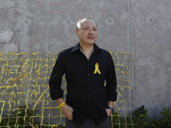 Benny Tai, 50, one of the founders of the "Occupy Central" civil disobedience movement, poses during a rally in Hong Kong September 26, 2014. Tai said, "I hope more people will join and hope it will be peaceful." China rules Hong Kong under a "one country, two systems" formula that accords the territory limited democracy.
