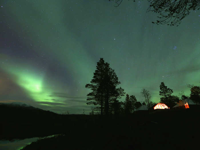 It normally takes between 10 and 30 seconds to take a picture of a bright aurora with a standard DSLR camera.