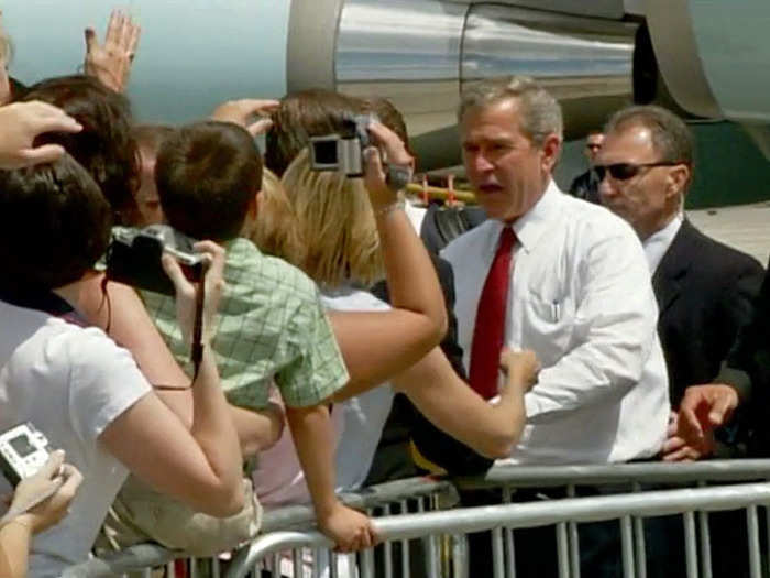 After the speech, the president shook hands with people — who the agents vetted before his arrival.