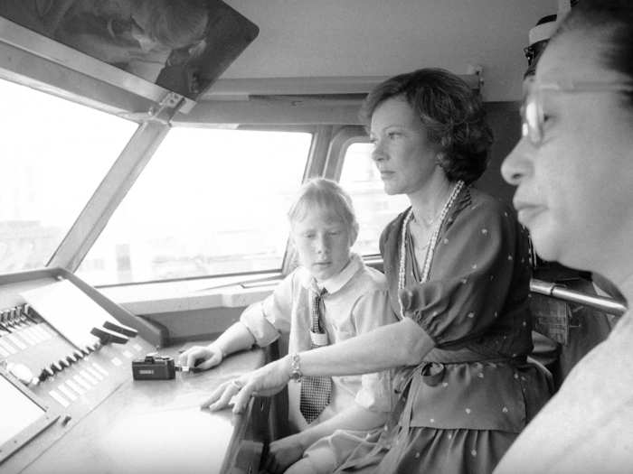 Former U.S. First Lady Rosalynn Carter and daughter Amy rode with the conductor.