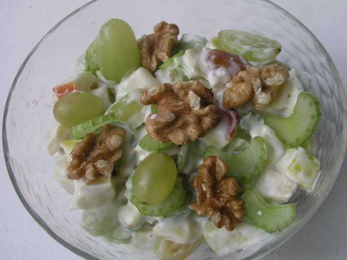 The classic Waldorf Salad, with apples, celery, and walnuts dressed in mayonnaise, was born here.