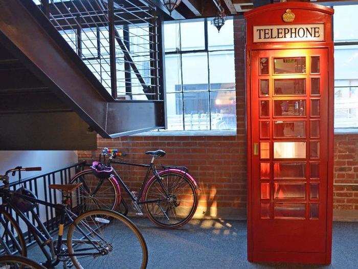 Across from the library is a phone booth for employees to make private calls.