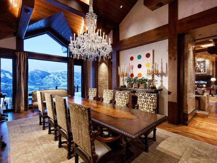 The dining room is equipped with a chandelier that would impress any dinner guest and seating for eight.