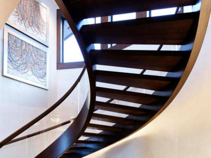 A winding staircase runs through the house.