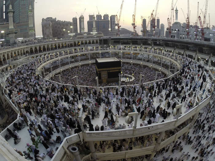 One of the main practices of the Hajj is visiting the Ka`bah, a sacred, cube-shaped building in the center of the Masjid al-Haram, the largest and most holy Mosque in the world. Followers must walk around the Ka`bah seven times and recite prayers.