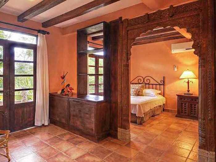 Feautring stunning millwork and imported Spanish and Italian tiles, the rooms have an earthy historic feel.