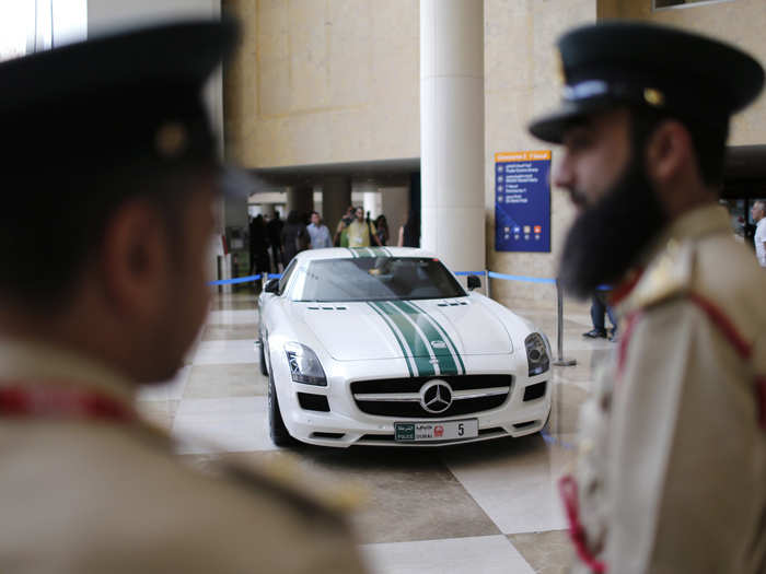 This Mercedes-Benz SLS AMG runs about $200,000, has room for only two, and can go from 0 to 60 mph in under 4 seconds.