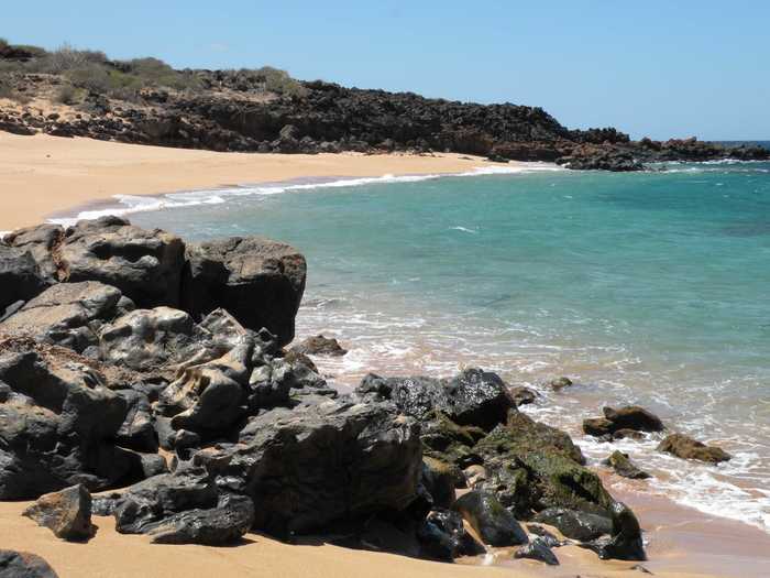 Lanai has some fabulous beaches, like this secluded spot on the northwest shore called Polihua Beach. Located just across the channel from Molokai, this beach is frequented by endangered green sea turtles and humpback whales.