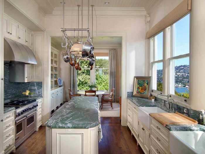 The beautiful kitchen has a butler’s pantry and a breakfast room.