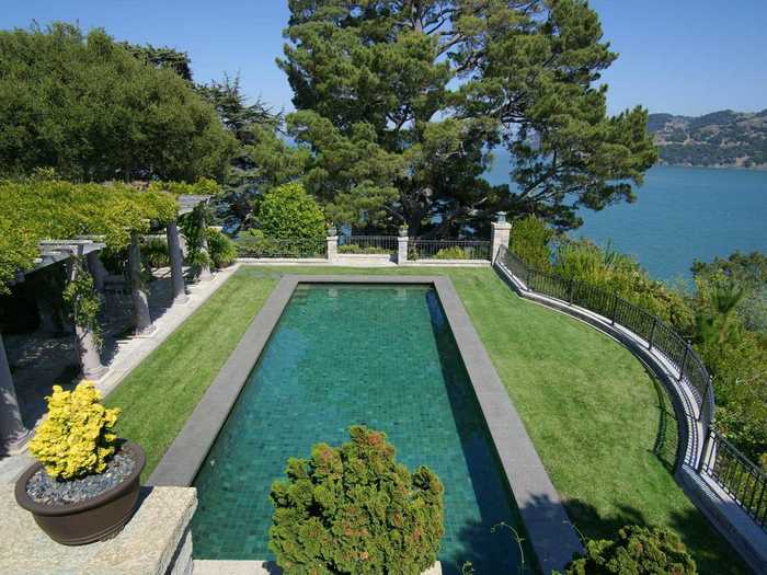 The pool is surrounded by imported stone.