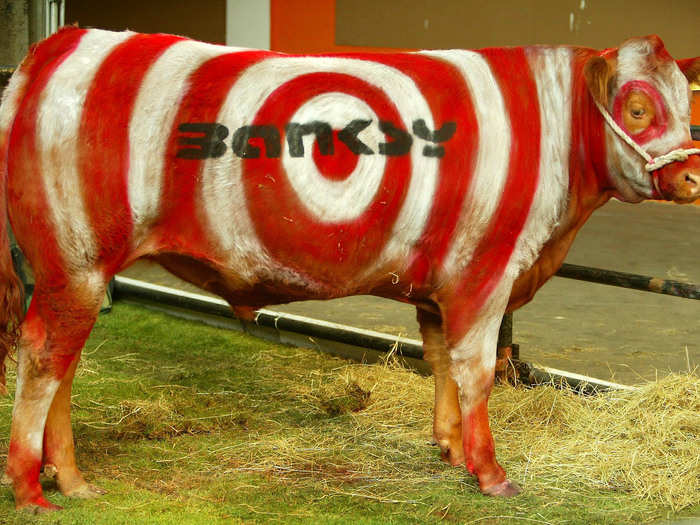 Sometimes, Banksy can get a little out there, like the time he painted and tagged his name on this cow.